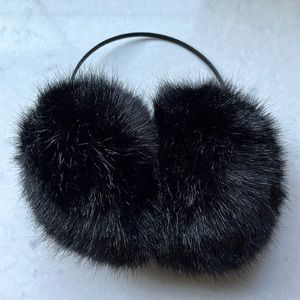 Large faux fur ear muffs.